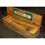 A Jaques croquet set, retailed by Harrods, in original pine box