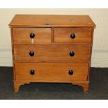 A Victorian pine chest, the rectangular top over two short and two graduated long drawers with