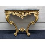 A 19th century style carved wood and gilt gesso console table with shaped marble top, 86cm wide