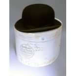 A bowler hat by Lock and Co together with a Lock and Co hat box, 61/2in ear to ear