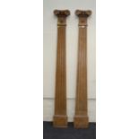 A pair of 19th century stripped pine architectural pilasters, of Doric form with scrolling capitals,