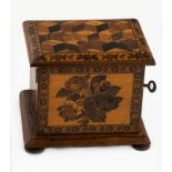 A 19th century Tunbridge ware table cabinet, decorated with tumbling cube and floral sprays, the