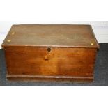 A 19th century pine coffer, the planked top over twin steel side handles and a vacant interior, 49 x