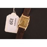 A gentleman's 18ct gold Vertex wristwatch, the rectangular dial with Arabic numerals and