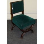 A 19th century oak green plush upholstered X frame side chair of Puginesque design