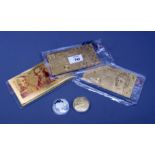 A small collection of gold plated 'Banknotes', including £50, £10 and £5 denominations, a 2012