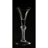A probably Dutch 19th century large hollow balustrade wine glass with etched and gilt monogram