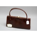 A brown Waldybag handbag