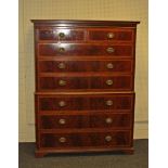 Shoolbred and Co, an Edwardian mahogany, satinwood crossbanded and boxwood strung chest on chest,