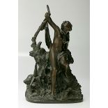 A 19th century continental bronze figure group of a nymph, dipping her toe in a flowing stream