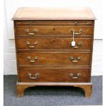 A George III mahogany bachelors chest, the rectangular, crossbanded top with moulded edge over