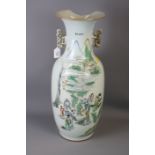 A large Chinese famille rose porcelain baluster vase, with fungus handles, painted with sages in a