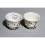 A pair of Chinese late 19th century/early 20th century famille rose porcelain wine cups of