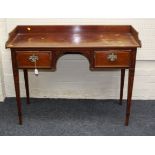 An Edwardian mahogany, boxwood strung washstand, the rectangular top with swept upstand over
