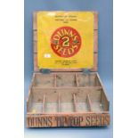 A vintage Dunns Seed counter top advertising display, of simple plank construction