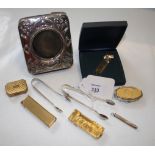 Dunhill, a gold plated engine turned cigarette lighter, signed 'Dunhill', together with another