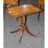 A George III crossbanded pillar wine table with rectangular top over a quadrupedal base, 64.5cm