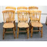 A set of six 19th century beech and elm lathe back dining chairs, each with arched rail, solid seat,