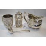 An Edwardian silver sugar caster, cylindrical with bayonet cover and scroll and foliate chased body,