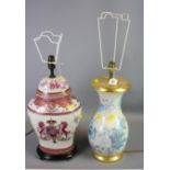 An armorial decorated pottery table lamp, baluster form, together with one other pottery table