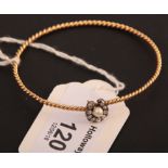 A Victorian diamond and pearl horseshoe bangle, the rope twist bangle, with hook clasp concealed