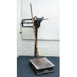 A T&W Avery of Birmingham 4cwt cast iron platform scale, with wooden height gauge