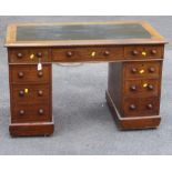 A Victorian mahogany twin pedestal kneehole writing desk with leather inset top, 118cm