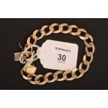 A 9ct gold flattened curb pattern bracelet, to concealed push button clasp