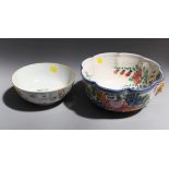 A Chinese 18th century porcelain famille rose bowl, a 1920s/30s Italian majolica glazed bowl with