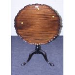 An Irish 18th century mahogany piecrust edged snap top tripod table, with claw and ball feet 175cm