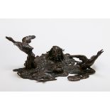 An early 20th century Austrian brown patinated bronze, cast as Bolotnik rising from a pool to
