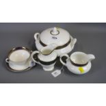 A Royal Doulton Rochelle part dinner and tea service, comprising a pair of lidded vegetable tureens,