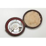 J. Newcomb, a 19th century mother of pearl pocket thermometer in a leather case, 5cm