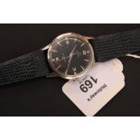 A gentleman's Omega Seamaster wristwatch, the circular black enamel dial with luminous Arabic and