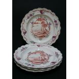 A set of four 18th century creamware dessert plates with raised moulded borders and the sole painted