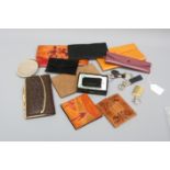 A selection of purses and key ring sets