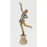 A 1930s cold painted spelter figure of a pirouetting lady, on an alabaster plinth, 33.5cm high