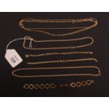 A 9ct gold ropetwist necklace, together with another similar, a fetter and three necklace and
