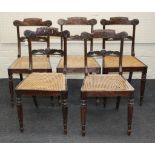 A set of four William IV simulated rosewood side chairs, with split cane seats and carved