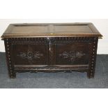 A mid 17thcentury oak two panel coffer, with stile supports, 130cmwide