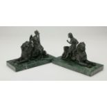 A pair of 19th century patinated and bronzed figures, of an Egyptian maiden seated on a Sphinx and