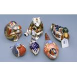 A collection of six Royal Crown Derby Imari decorated paperweights, polar bear, monkeys, robin,
