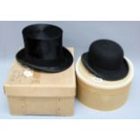 An Austin Reed bowler hat together with a Scott & Co black silk top hat in boxes