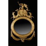 A Regency giltwood wall mirror, the surmount carved with Neptune atop an open scallop shell