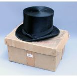 A top hat by Henry Heath with box