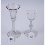 An 18th century trumpet bowled ale glass, with multiple air twist plain stem above a spreading foot,