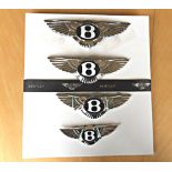 Four Bentley modern winged car badges, widths tip to tip: 7.50in, 7in, 6.25in and 4.9in, the two