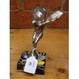 A silver hallmarked standing Spirit of Ecstasy model on a marbled plinth