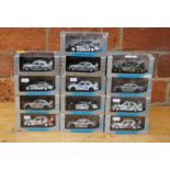 A collection of eleven Minichamps and two Berlin 2000 1:43 cased 1993 Mercedes Benz tourer cars, one