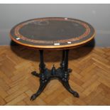 An Aesthetic Period ebonised burr walnut inlaid and strung occasional table, the oval top on a